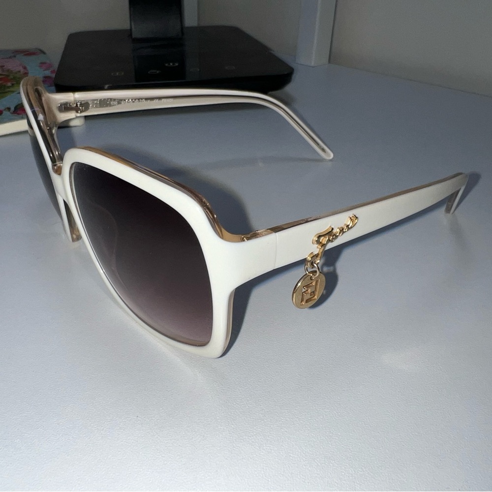 Fendi sunglasses with gold logo and dangle charm